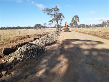 Additional ballast rock going in for the widening on Hawthorne Drive to address unsuitable subgrade.jpg